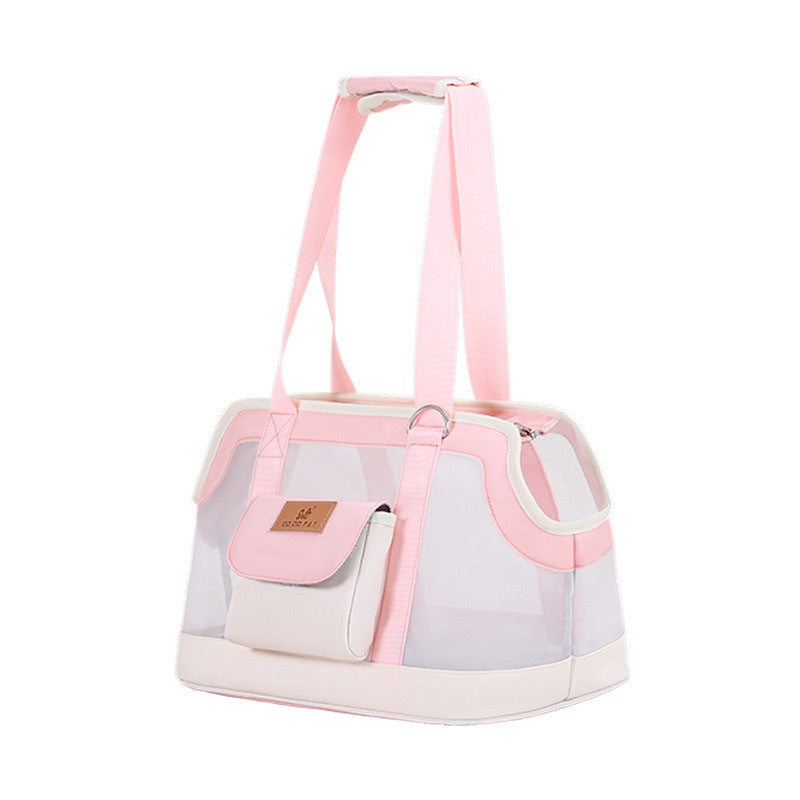 Pet carrier bag lifestyle photo — person carrying small cat in shoulder bag | Pawnests
