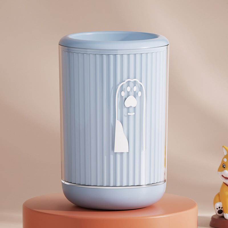 Pawnests paw cleaner cup in use with small dog