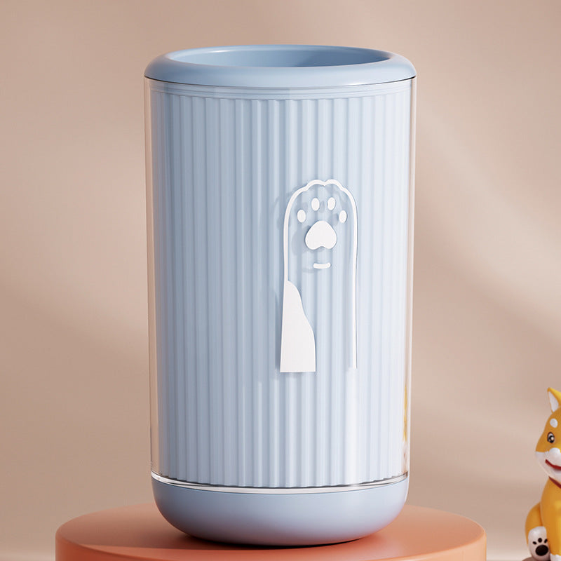 Pawnests paw cleaner cup — cat using the product