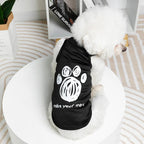 PAW graphic pet vest being worn by small dog — Pawnests