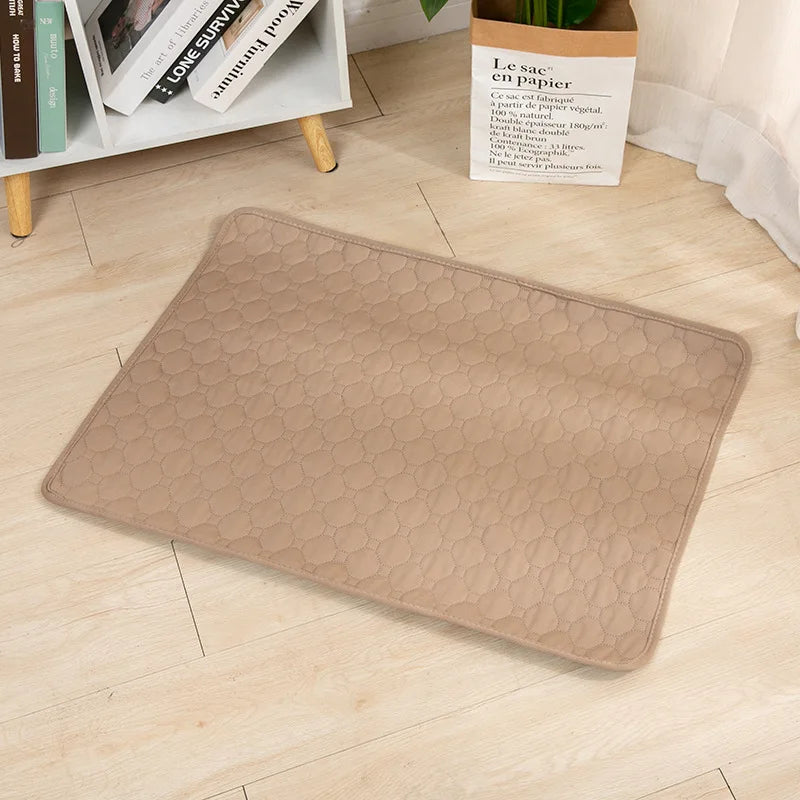 Khaki quilted washable dog pee pad on a wood floor | Pawnests